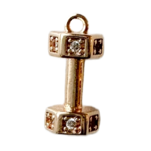 Golden dumbbell hand weight charm with pave crystals