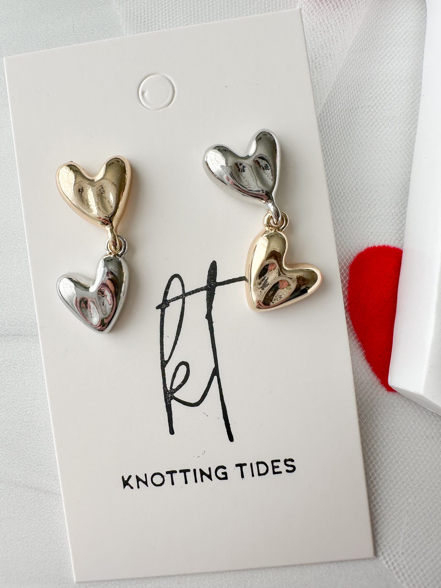 Two-tone heart earrings