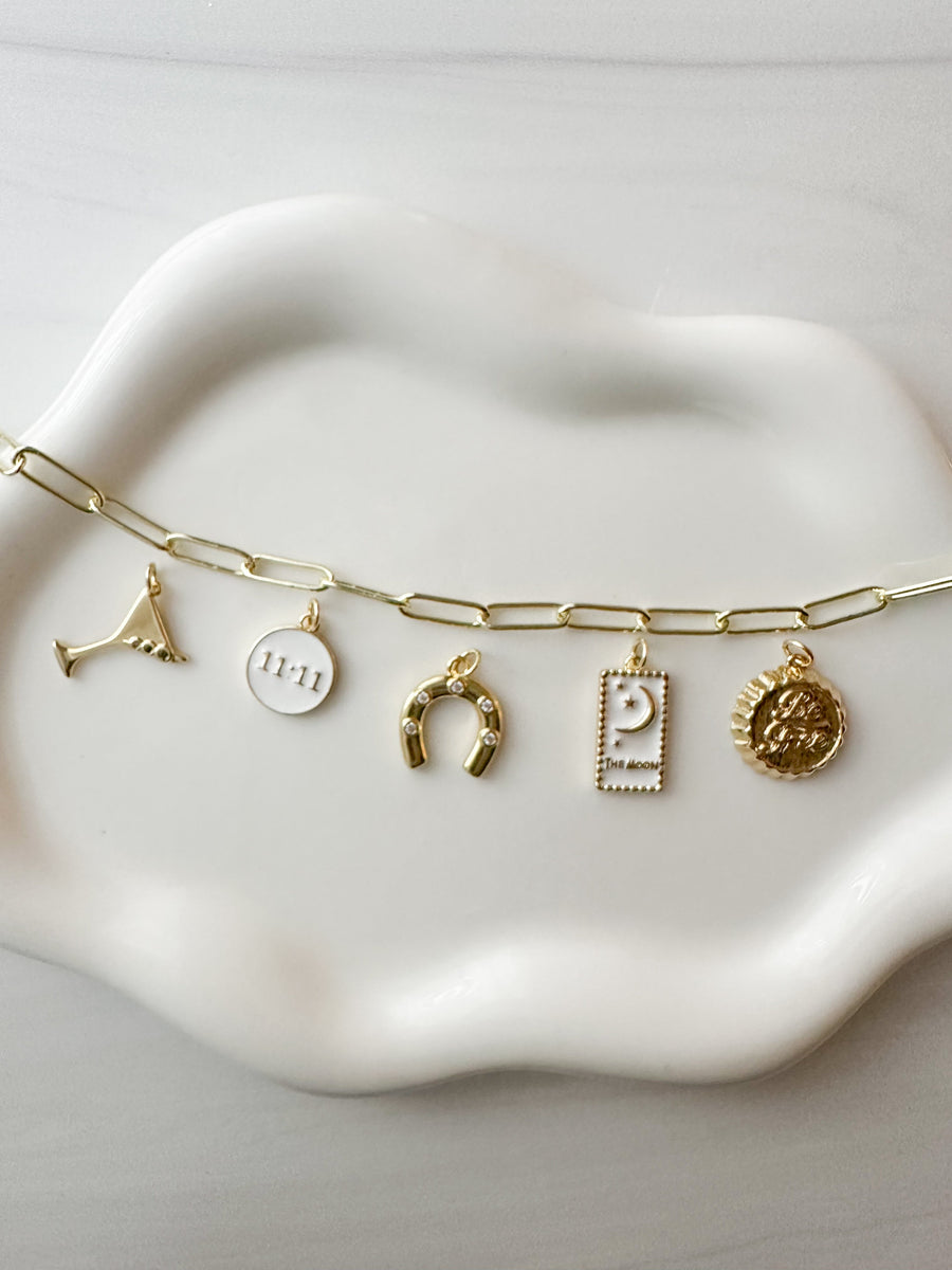 Custom charm necklace arrangement