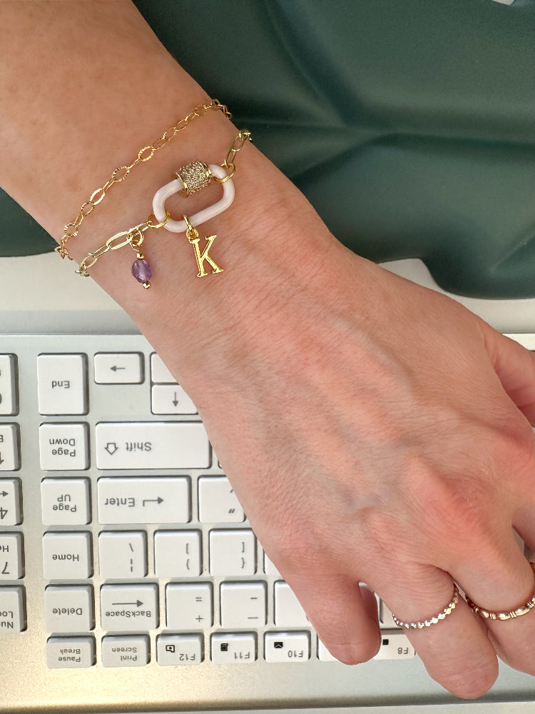 Custom charm bracelet with amethyst crystal and initial charms